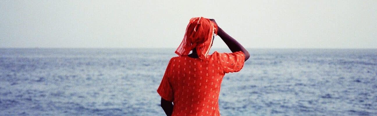 Woman looking out to sea