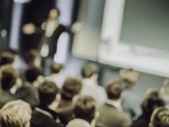 People listening to a presentation